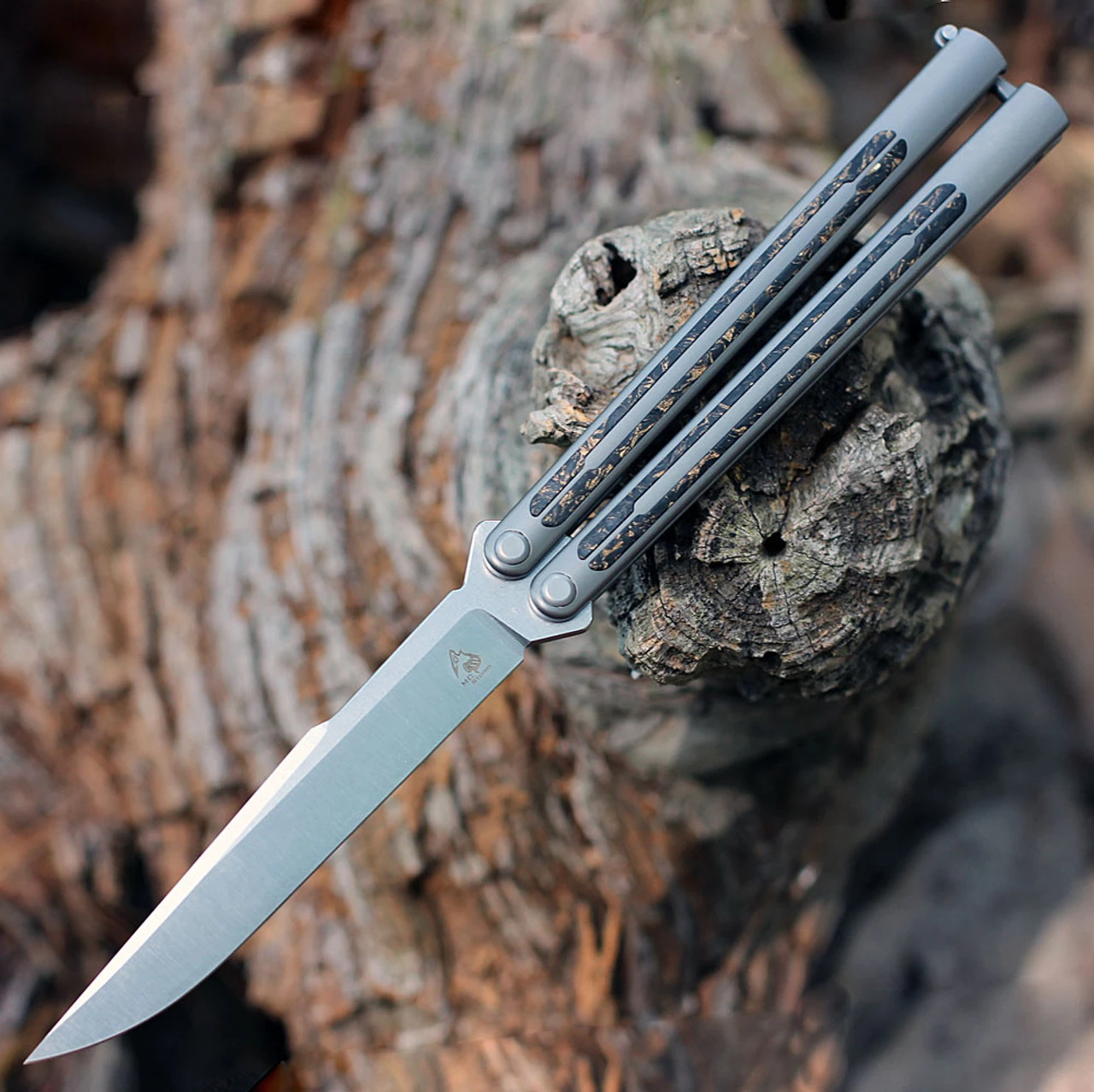 Maxace Apostle Channel Balisong - Ti /CF (4.7" M390) MCAP01 3 Maxace Apostle Channel Balisong - Ti /CF (4.7" M390) MCAP01